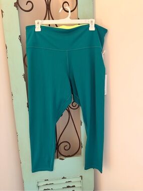Teal Athleta Elation 7/8 Leggings with Lime Waistband